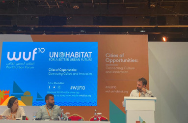 Liel Maghen presenting at a UN conference on urbanization in Abu Dhabi